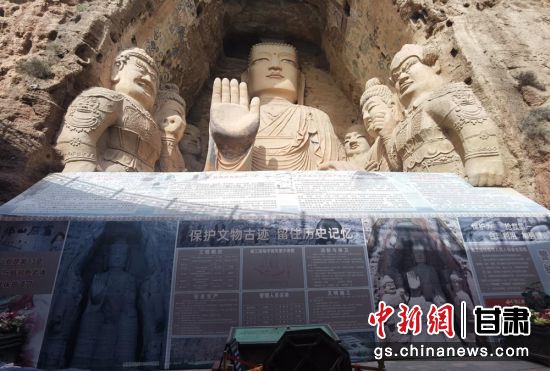 時下，中國“石窟鼻祖”天梯山石窟第13窟大佛足部與局部危巖體搶救性保護項目正在施工。圖為施工現(xiàn)場。陳曉斌 攝