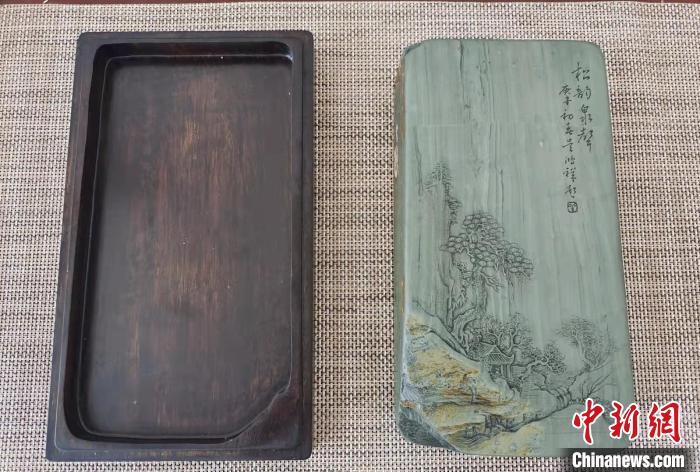 圖為盧保勝為提升洮硯文化內(nèi)涵，制作“一硯一銘、一盒一拓”成品展示?！堟?攝